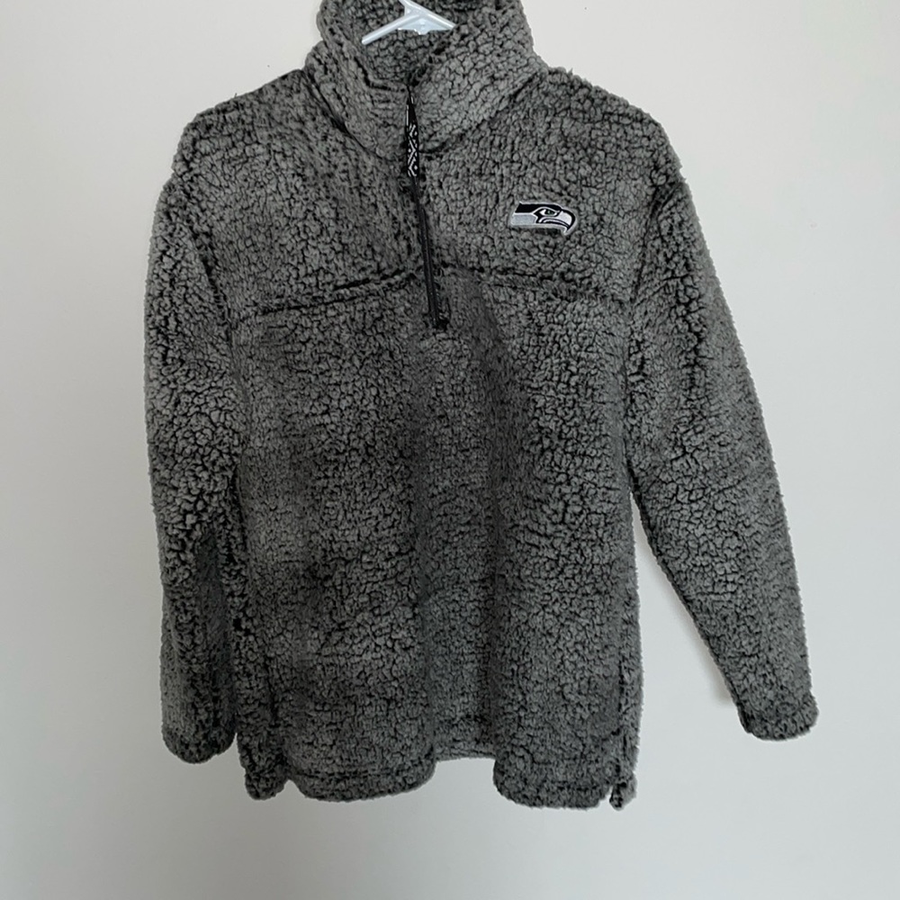 This is a small Seattle Seahawks fuzzy sweatshirt.
